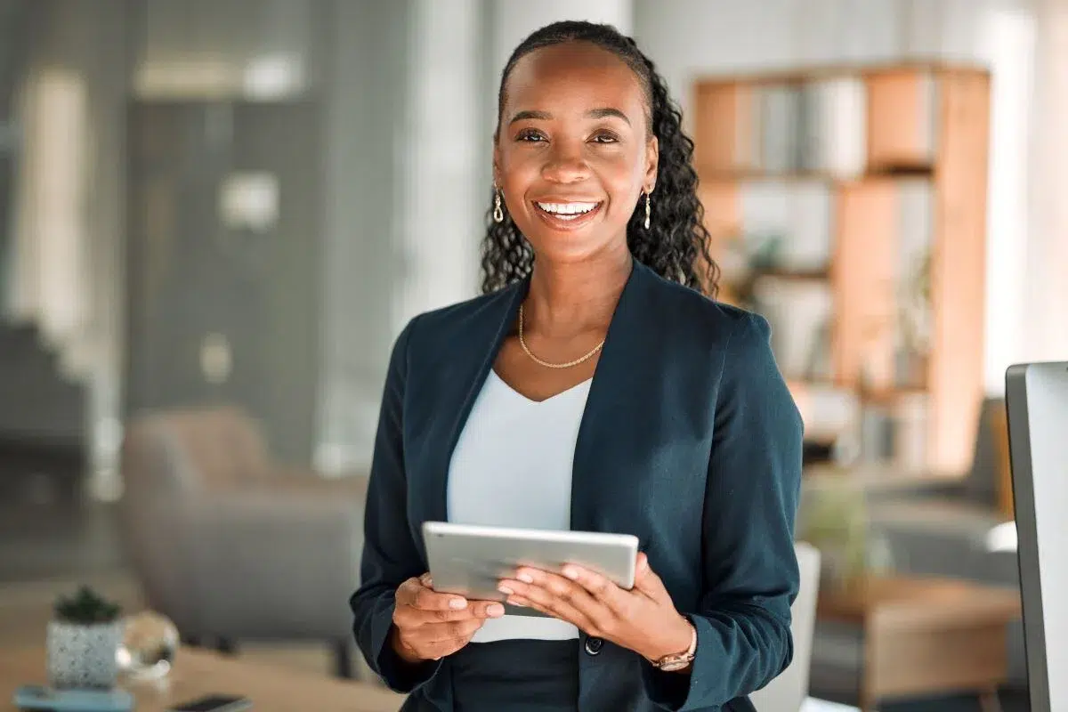 Woman holding tablet and preparing for a talk about digital transformation