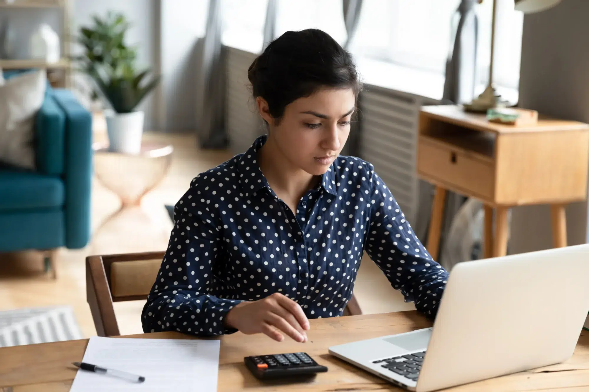 Woman managing her company expenses in new work environment